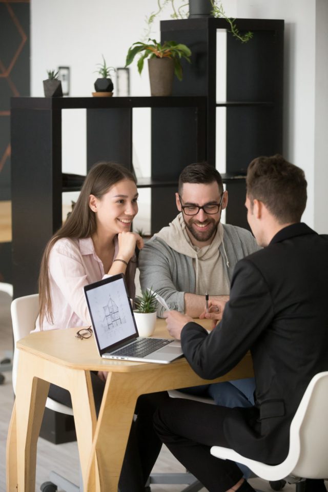 contractor sitting with clients earning a reputation