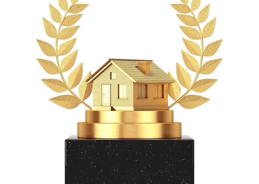 https://www.solidstateconstruction.com/wp-content/uploads/2021/10/bigstock-Winner-Award-Cube-Gold-Laurel-428879576-900x640.jpg