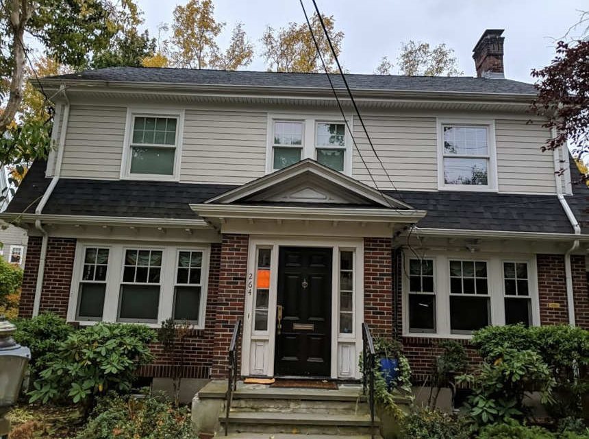 https://www.solidstateconstruction.com/wp-content/uploads/2022/06/Newton-MA-Siding-Installation-James-Hardie-Fiber-Cement-Solid-State-Construction-860x640.jpg