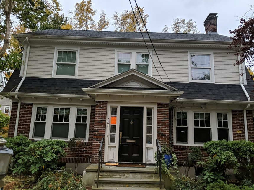 https://www.solidstateconstruction.com/wp-content/uploads/2022/06/Newton-MA-Siding-Installation-James-Hardie-Fiber-Cement-Solid-State-Construction.jpg